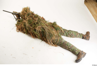 Photos Brandon Davis in Ghillie suit Pose aiming gun lying…